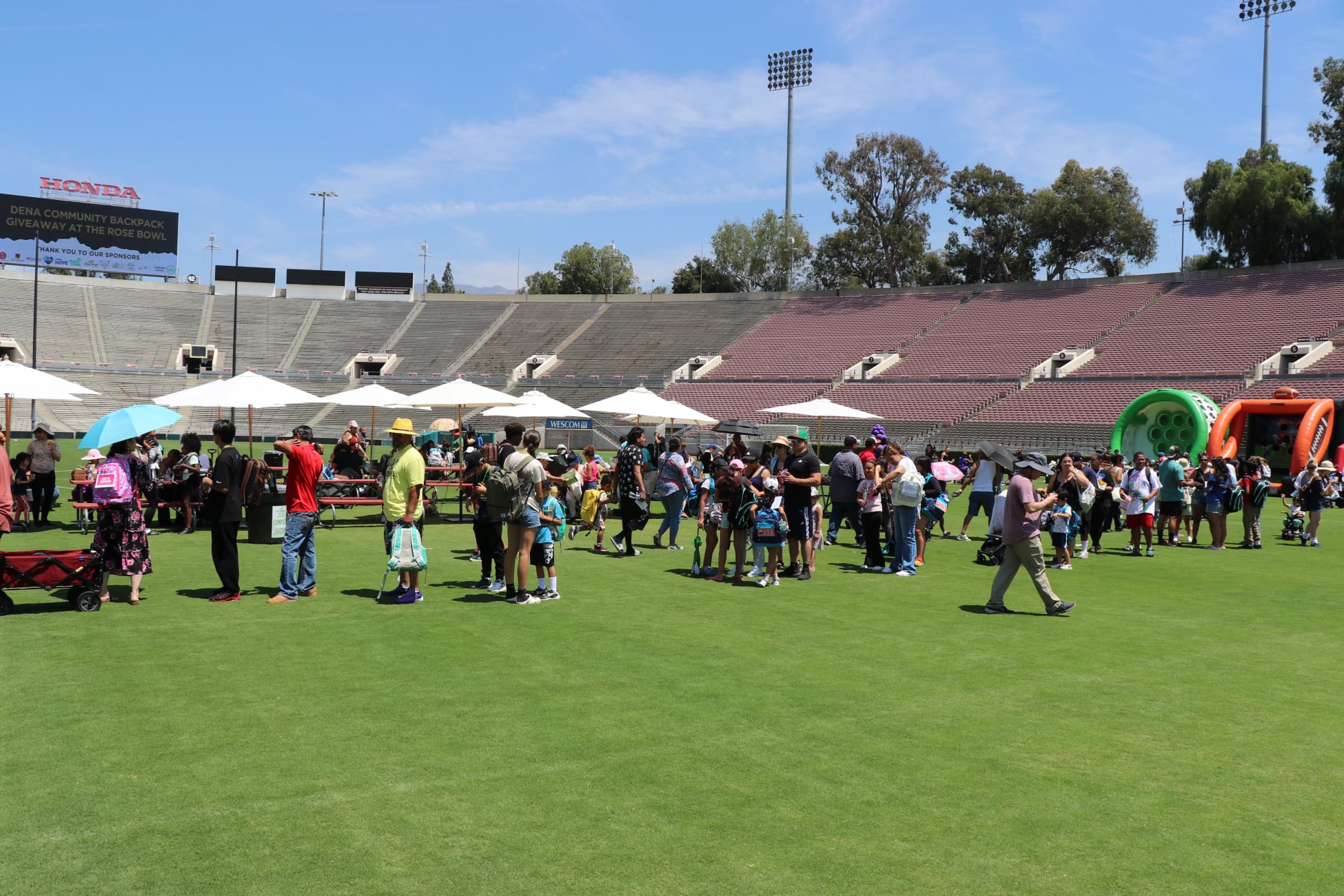 Altadena community backpack giveaway event near Pasadena and the Rose Bowl